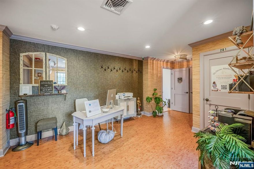 **Private Wellness Suite at The Collective | Turnkey | Bergen County** Welcome to The Collectiveâ€”a curated sanctuary for wellness, beauty, and holistic health professionals ready to grow in an elevated, supportive environment. This turnkey private suite (~200 sqft) offers a rare chance to step into a fully realized space without the burden of building or managing your own location. Designed w/ both practitioner and client experience in mind, the suite features natural light, cork flooring, and a calm, refined aesthetic ideal for high-quality care. Itâ€™s well suited for acupuncture, functional medicine, or private beauty and wellness sessions, & also works as a secondary or satellite location. More than just square footage, this offering includes a complete brand environment w/ utilities, shared amenities, and a cohesive luxury buildout. Practitioners benefit from operational ease w/ on-site laundry, cleaning services, property management, and access to a welcoming waiting area and well-maintained bathrooms. The Collective fosters both independence and community. A shared retail space allows product display, while events, education, and yoga classes create visibility and connection. With non-overlapping specialties, your services remain distinctâ€”helping you stand out while benefiting from an established flow of aligned clientele. This is more than a suiteâ€”itâ€™s a fully supported ecosystem for professionals focused on their craft while growing within a like-minded commu