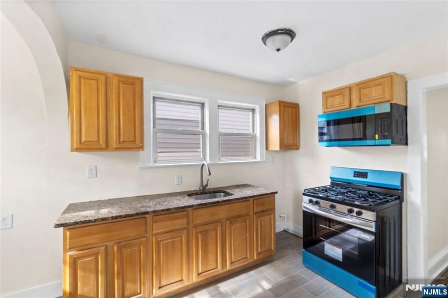 Prime 2-Family Investment Opportunity - Fully Vacant & Renovated! Unlock the potential of this cash-flowing investment property! This fully renovated 2-family home in the heart of Newark offers 5 bedrooms and 2 bathrooms, driveway, and 2 garages providing an incredible opportunity for investors or owner-occupants looking to maximize rental income. Spacious Layout - Large multi-family home with generous living space in each unit. Turnkey Investment - Fully renovated with modern finishes, move-in ready for tenants or homeowners. High Rental Potential - Ideal for long-term tenants or house hacking. Prime Location - Nestled on a great street, close to all major highways and public transportation, ensuring easy commutes to NYC and beyond. Investor's dream!