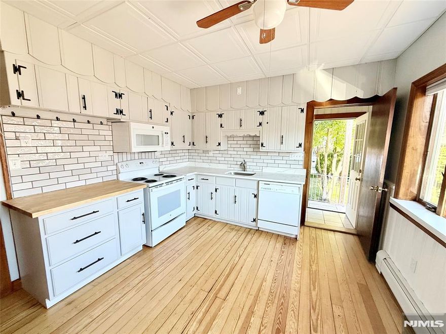 Cozy 1st floor apartment is ready for rent in Wallington, NJ. Unit offers renovated eat in kitchen with electric stove, 2 bedrooms with close space, living room, full bath. There is designated storage area in basement and washer/dryer hook up (tenant supply appliances). Shared use of back yard with the 2nd floor tenant and 2 parking spaces in driveway. 2 entries; back and front. Move in ready asap. Don't wait, set up your appointment now! Credit, interview and proof of income required, along with 1.5 months security due at the signing of the lease.