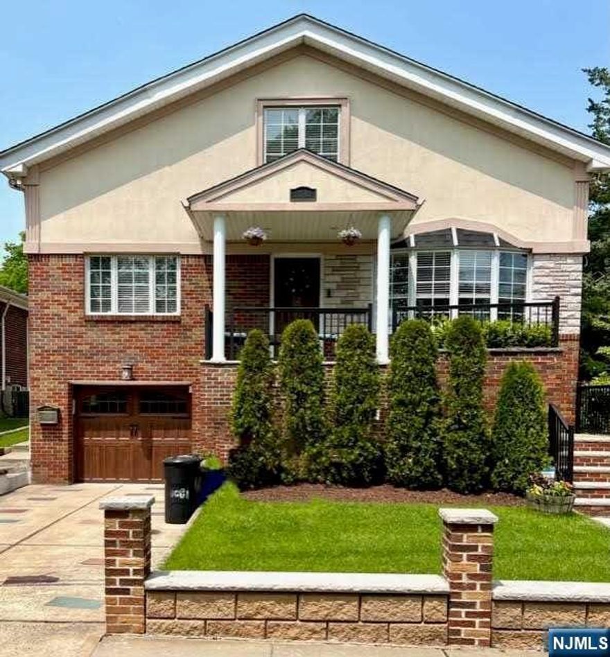 Nestled in a quiet residential area next to the Inwood Terrace Park, this spacious 4 BR/ 3 BTH modern Colonial is ideally located in close proximity to the elementary school and NYC access. Enjoy your morning coffee on the balcony right off the dining room. The sun-filled dining room flows seamlessly into the living room and entrance foyer. The adjoining eat-in kitchen features stainless steel appliances. An access to the rear patio and fully fenced yard is ideal for entertaining. The first floor also features two large bedrooms and a full bath. The second floor with its cathedral ceilings boasts a large loft, which makes for a great play or work area. Here you also find the large primary bedroom with walk-in closet and adjoining private bath. The finished lower level offers a large family room, the 4th bedroom with a full bath, Laundry plus additional storage rooms as well as the built-in garage with a adjoining mudroom. House has solar and first 1,000 kWh per month is free!!!