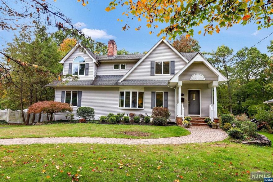 WELCOME HOME!! THIS IS THE HOME YOU'VE BEEN WAITING FOR! AMPLE SPACE TO ENJOY THROUGHOUT THIS BEAUTIFUL COLONIAL SET ON OVERSIZED LOT ON GREAT MAHWAH STREET! ENTER INTO TREMENDOUS LIVING ROOM WITH BRICK FIREPLACE, GENEROUS EIK WITH ISLAND SEATING, CONNECTED DINING AREA AND SLIDERS TO DECK OVERLOOKING PARK LIKE REAR YARD-THE PERFECT FLOW FOR ENTERTAING, A FRONT TO BACK 1ST FLR BEDROOM OFFERS TREMENDOUS, NATURAL LIGHT,CLOSET SPACE AND.5 BATH. BEAUTIFUL UPDATED TILE HALL FULL BATH COMPLETES 1ST FLR. 2ND FLR BOASTS TREMENDOUS PRIMARY SUITE WITH AMAZING CLOSET SPACE & SUMPUOUS BATH, ANOTHER BEDROOM & A HALL REC RM/DEN(COULD BE 4TH BEDROOM).THE LOWER LEVEL OFFERS A MASSIVE FAMILY ROOM WITH BRICK FIREPLACE AND WALK OUT WITH FRENCH DOORS TO GORGEOUS YARD. SO CLOSE TO TOWN AND SCHOOLS- TRULY A MUST SEE TO APPRECIATE ALL THAT THIS LARGE LOVELY HOME HAS TO OFFER!!