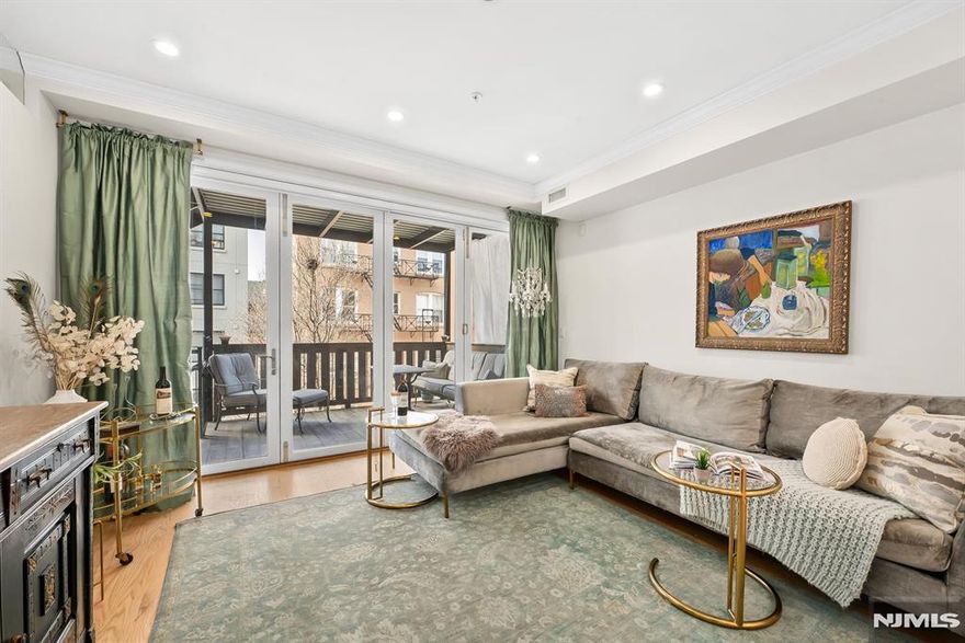 Welcome to this sophisticated 3-bedroom, 2-bath residence offering a seamless blend of privacy, scale, and modern luxury. A private keyed elevator opens directly into the home, setting the tone for an elevated living experience. Designed for both refined living and effortless entertaining, the expansive open-concept great room is anchored by a striking retractable nano wall that fully opens to a private terraceâ€”creating a dramatic indoor-outdoor flow rarely found in Hoboken. The chefâ€™s vented kitchen is both elegant and functional, featuring a premium Bosch appliance package, sleek granite countertops, custom floating shelving, designer pendant lighting, and an oversized island ideal for gathering and entertaining. The primary suite is a tranquil retreat, bathed in natural light and complete with generous custom closets and a spa-inspired en-suite bath. Two additional bedrooms are thoughtfully proportioned, offering flexibility for guests, a home office, or additional living space, all complemented by excellent storage throughout. Modern comforts include a Nest smart thermostat, full-size Whirlpool washer and dryer, and carefully curated finishes that enhance both style and function. Perfectly positioned in the heart of midtown Hoboken, this residence offers unparalleled access to NYC via NJ Transit bus, PATH, Light Rail, and Ferry, while being just moments from Hobokenâ€™s most sought-after dining, shopping, parks, and waterfront.