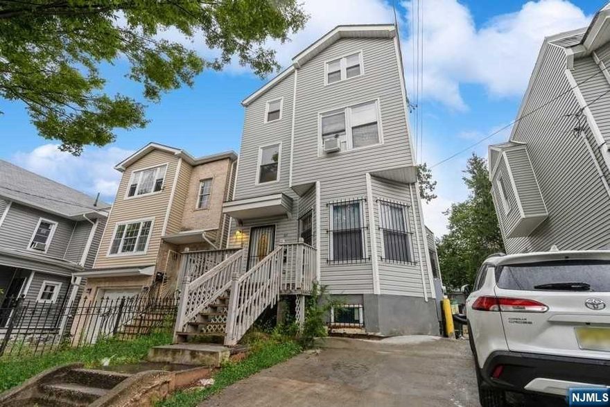 Turn key ready for owner occupant or investment property. Over 3400 SF of living space with 1st floor - 965 SF, 2nd Floor 960 SF,Finished attic space 750 Sf, and finished basement 728 SF.