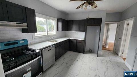 Photo of 99 Carlton Ave, East Rutherford, NJ 07073 (MLS # 26019680)
