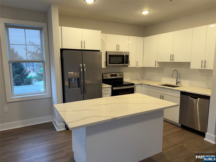 **FIRST MONTH FREE on a 13-month lease + one parking space included! - for occupancy commencing on or before 4/1/26!** Welcome to The Addison - Fort Lee's new luxury rental building offering a variety of upscale, spacious floor-plans. The Addison offers high-end residences fully equipped w/ modern kitchens w/ stainless steel appliances, quartz countertops, full islands & tiled backsplashes, open living/dining areas, shades on all windows, modern bathrooms & a full-sized washer & dryer in each unit. Exclusive 24/7 virtual doorman service for communications, package deliveries & access control via video intercom system linked to your smart phone. The Addison includes a large on-site fitness center including virtual touchscreen workout mirror, electric car charging stations & parking garage w/ direct elevator access to all residences for uncompromising security. Pet friendly - (25 lb limit) $500 pet fee + pet rent per month! Tenants pay ALL utilities! All amenities INCLUDED in the rent! PARKING: 1st space INCLUDED IN THE RENT(!); Additional space - $125/monthly! Virtual tour available upon request!