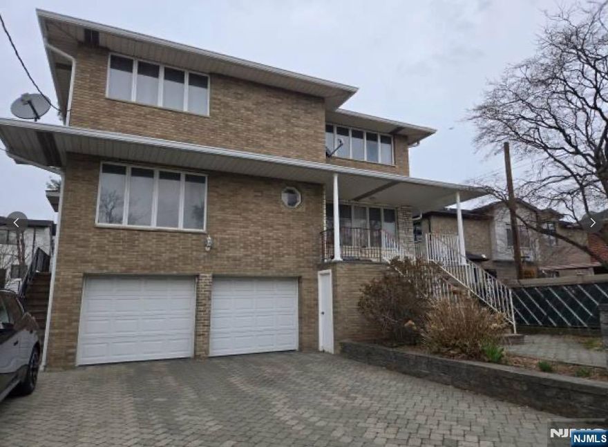 Spacious and Bright Home in a Quiet, Convenient Location This well-maintained unit features three generously sized, sun-filled rooms, two full bathrooms, a large living room, and a modern eat-in kitchen with a formal dining areaâ€”perfect for comfortable living and entertaining. Recently refinished hardwood floors run throughout, and the home has been freshly painted. Washer and dryer are conveniently located on the ground floor. Includes two parking spaces (garage + driveway). All utilities are on separate meters. Located close to both elementary and middle schools, making it an ideal home for families. Donâ€™t miss outâ€”this home is a great value and wonâ€™t last long!