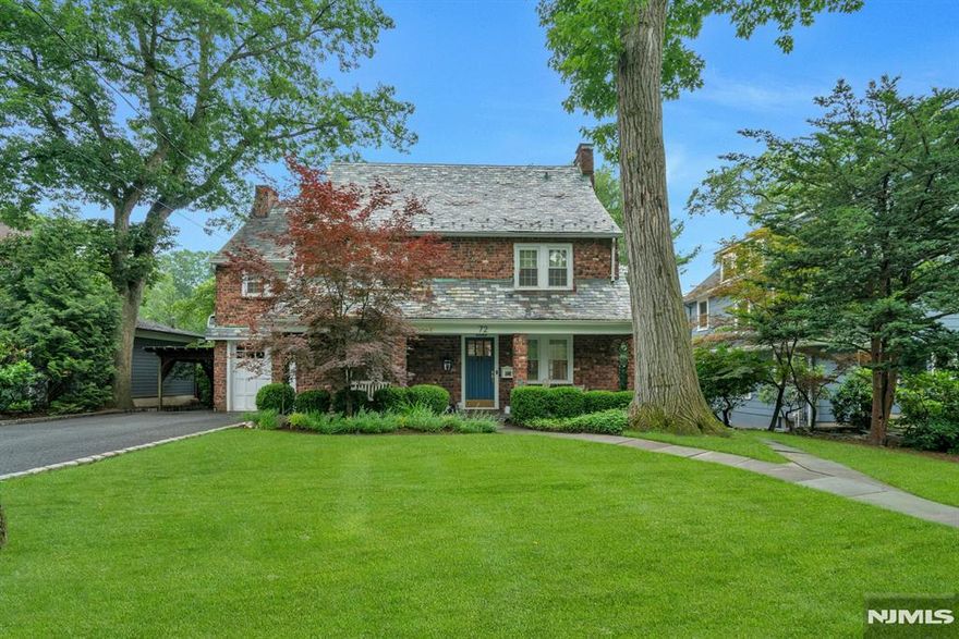 Discover unparalleled elegance at 72 Ridge Road, a beautifully updated 5-bedroom, 3.5-bathroom Brick Colonial in Ridgewood's coveted Heights neighborhood. Perfectly positioned just one block from NYC train access, downtown shops, restaurants, and top-rated schools, this home combines luxury and convenience, with Manhattan just 15 miles away. Set on a private 0.3-acre lot on a serene street among Ridgewood's finest residences, this deceptively spacious 3,100 sq. ft. home exudes timeless charm with modern flair. Custom built-ins, fine finishes, and classic architectural details create an inviting ambiance. The chefâ€™s kitchen features a Bertazzoni gas oven, white quartzite countertops, crackled beveled subway tile backsplash, and hand-scraped hardwood floors that flow seamlessly into the airy living spaces. Entertain in the elegant living room with a gas fireplace or host in the formal dining room. The family room opens to a bluestone patio and landscaped backyard. A chic powder room by Artistic Tile adds glamour. Upstairs, the handsome primary suite offers a spa-inspired bath, radiant heat and custom built-in closets. Three large bedrooms share a stylish bath with radiant heat. The finished basement includes a gym/play area, half bath, laundry, and storage. Additional highlights include a fully fenced yard with mature landscapingâ€”a tranquil oasis. 72 Ridge Road is a rare find, blending sophisticated design, generous space, and prime locationâ€”a must-see home!