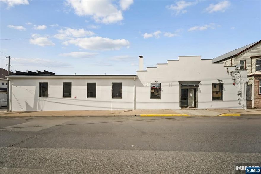 Freestanding Corner Warehouse with Drive-In Dock, Office, Basement & New Sprinkler System.Exceptional opportunity to own a versatile warehouse located on a 50x100 corner lot in Paterson. This well-equipped property features a drive-in loading dock, private office space, two restrooms, full basement for additional storage, and newly installed sprinkler system. Ideal for contractors, plumbing/HVAC businesses, electrical companies, e-commerce operations, light distribution, storage use, or owner-user headquarters. Functional layout allows separation of office and operational areas. Corner location provides accessibility and added exposure.Located in an R-3 zone. Buyer responsible for conducting their own due diligence regarding zoning and permitted uses.Rare opportunity for owner-operators or investors seeking flexible industrial-style space with valuable upgrades already completed.