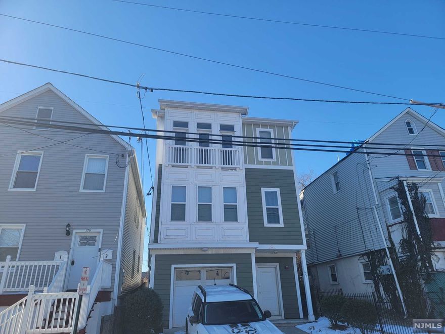 Welcome home to this younger home, close to major highway, and best of all private back yard, garage parking, and less than 10 years old. There are 2 units each with 3 bedrooms, two bathrooms, and gorgerous hard wood floors with separate ultilities.