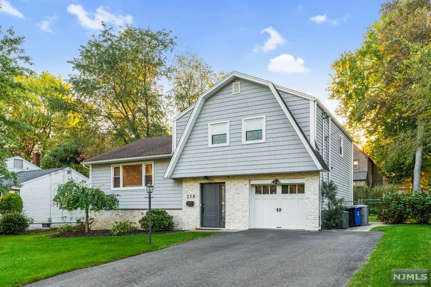 MOVE-IN READY! Just unpack your bags and welcome to this well-maintained sugar maple split home located on the most beautiful block in the heart of Hillsdale. The home features 3 bedrooms and 2 bathrooms with NEW siding, soffits, and gutters; NEW custom-built kitchen with Caesarstone quartz countertop with NEW top-of-the-line appliances and hardware; NEW butcher block kitchen island; NEW hickory hardwood floors; new molding. Custom wooden blinds. NEW whole house water filtration system and water softener system in addition to reverse osmosis filtration under kitchen sink. 2-zone baseboard heating; central A/C; whole house natural gas back-up generator. Top-rated schools & EZ NYC Commute! Incredible lifestyle!