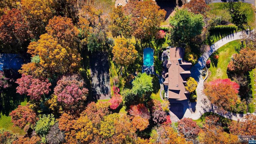 The opportunity of a lifetime is here, create your Saddle River Dream Home! This classic 5 Bed/5.5 Bath Brick Estate offers complete elegance & privacy; through the Iron Gated entrance you travel up the winding circular paver driveway, your Manor awaits. Welcome to 20 Cameron Road, a classic Saddle River Manor nestled on a private/professionally landscaped 2+ acre lot. This home has it all; Iron Gated Entrance, Heated Gunite Pool, Tennis Court, Gym, Dry Sauna, Guest Suite w/ Private Entrance, Executive Office/Library and boasts nearly 6,200 total Sq. Ft. of live-able space. Truly an entertainer's home; 2-Story Marble E/F, Fml D/R, Fml L/R w/ FPL, GR w/ Trey Ceilings/Cove Lighting/FPL, French Doors to a Bluestone Patio/Pool, EIK w/ 2 Pantries & additional Staircase. 2nd Floor: Primary Bedroom Suite w/ FPL/(2) WIC's/Primary Bath/Private Toilet/Bidet & Bonus Room. Additionally, 3 BR's (1 Ensuite) & a Guest Suite w/ FB & Private Outdoor Entrance. Fully finished basement & 3Car Garage.