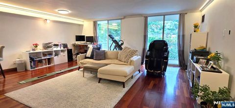 Photo of 1055 River Road #302, Edgewater, NJ 07020 (MLS # 26019080)