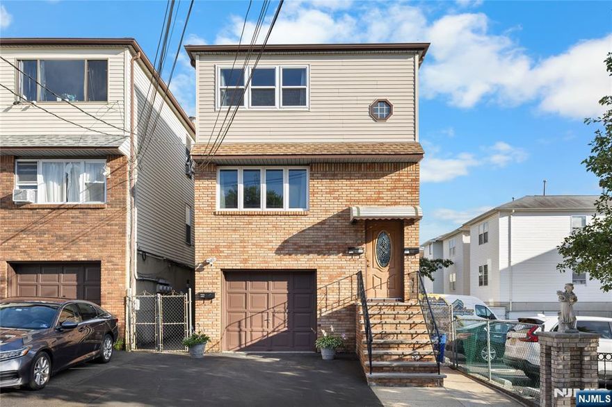 1st Fl apartment with Living room, dining area, kitchen, 3 bedrooms & 1 bath. Hardwood floors, tiled kitchens and bath. Gas forced air heat and central air conditioning system, Backyard access. Garage/ Parking space available with an extra fee! Located approx 3/4 of a mile to the Harrison PATH Station!