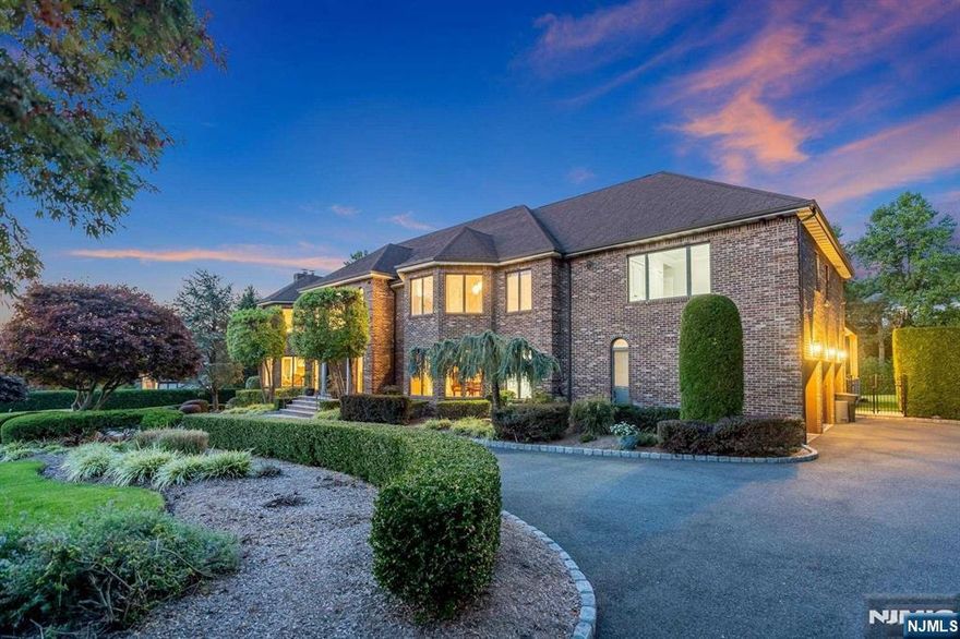 Experience carefree, high-end resort-style living at Tammy Brook East Hill Estate. Nestled in a picturesque paradise, the meticulously landscaped grounds of the estate are a work of art in themselves. Featuring a motorized louvered roof patio and a fully equipped custom outdoor kitchen, a marvelous salt water gunite pool w/ stone slide and spa, serene waterfalls, and lush gardens provide a tranquil escape. Enter through impressive doors and instantly embrace the relaxing interiors. Double height great room w/FPL. The heart of the home is the spacious kitchen, designed for both daily living and hosting. It features a large center island, top-tier appliances, and a sun-drenched breakfast nook overlooking the grounds. A sumptuous primary suite with a beautiful bathroom and walk-in closet. Entertainer's dream basement with a media room, wine room and fitness center that includes a built-in exercise pool and gym. Never before has a property of this magnitude been offered. Easy access to NYC