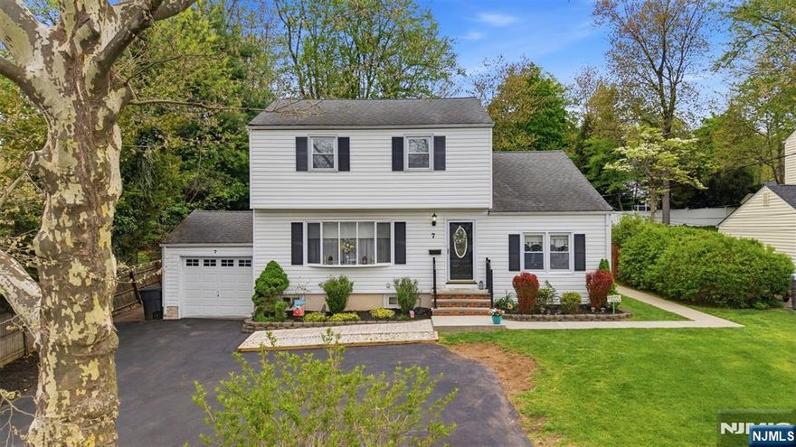 Set in a premier in-town location within one of the areaâ€™s most sought-after communities, this expanded 4-bedroom, 2-full-bath Colonial offers timeless character, generous space, and exceptional convenience. Close to schools, shops, dining, amenities, and commuter routes, it offers easy access to the elementary school, high school, and school transportation. Inside, classic charm blends with updates including hardwood floors, crown molding, a dining room with tray ceiling, and a living room with bow window. The renovated kitchen features cherry cabinetry, granite countertops, glass tile backsplash, stainless steel appliances, walk-in pantry, pass-through to the dining room, and coffee bar with stone accent wall. The expanded floor plan adds a comfortable family room with hardwood floors, abundant windows, sliding doors to the screened porch, and a nearby main-level full bath. Upstairs are four bedrooms, including an expanded bedroom with vaulted-style ceiling, wall of closets, and cubby/eave storage. The primary bedroom offers a large closet, ceiling fan, and hardwood beneath the carpet, while the updated hall bath includes a tub/shower with tile surround. The full basement offers a recreation area, laundry/utility space, workbench, storage, and unfinished space beneath the addition. Outdoor living includes a screened porch with slate floor and ceiling fan overlooking a fenced yard with patio, fire pit, shed, and garden area. New front pavers and sidewalk enhance curb appea