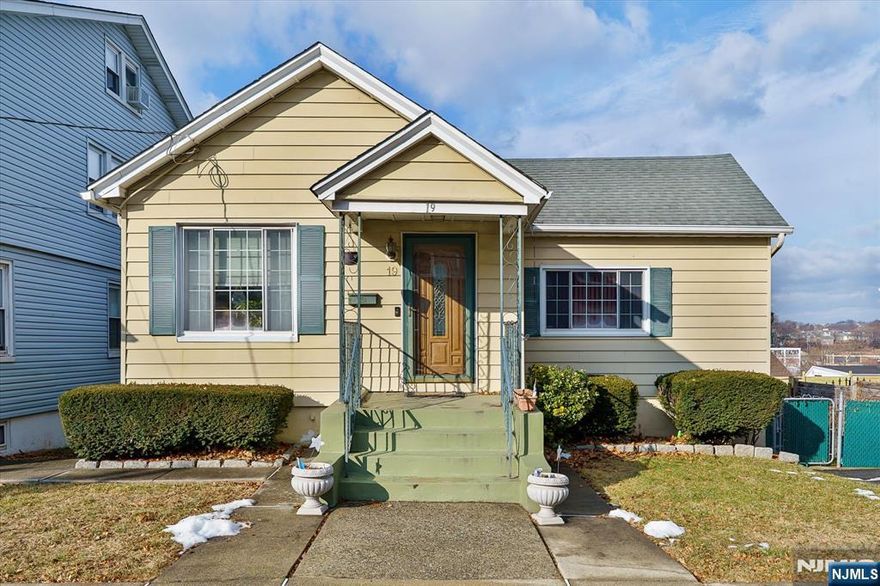 This well-maintained raised ranch is conveniently located on a dead-end street adjacent to Veteran's Field and features three bedrooms, a bright living room, dining room, kitchen with stainless steel appliances, and a full bath on the main level. The fully finished basement offers a spacious family room, an additional bedroom, a full bath, laundry and storage area with separate side entrance and direct access to the fenced backyardâ€”ideal for extended living or entertaining. Additional highlights include full-length attic storage and a private driveway for one car.