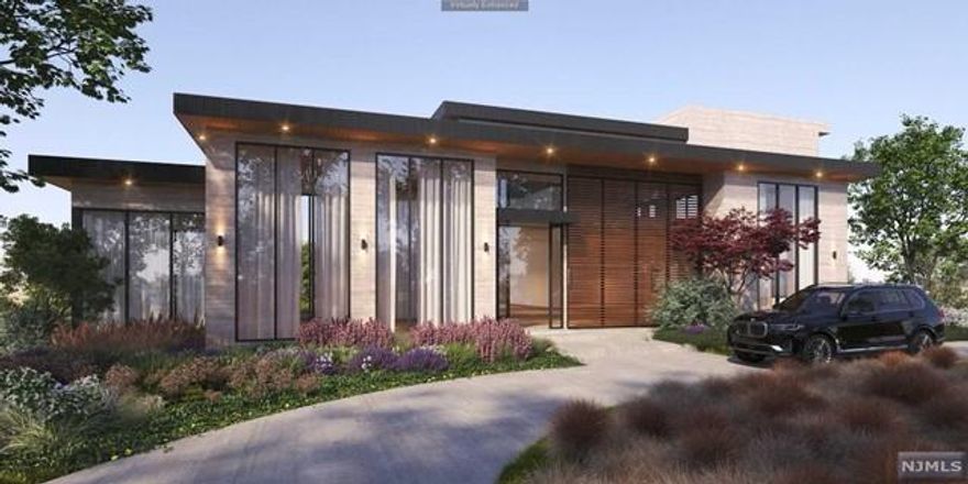 Welcome to this extraordinary modern estate, perched on Tenafly's east hill backing up to a nature preserve on nearly 1 acre - minutes from the GWB. Over 10,000sqft and clad in Italian Travertine, enjoy the epitome of luxury living this home offers. 12'-20' high ceilings through the 1st floor with 8" select french white oak floors. Gourmet Italian kitchen, Miele appliances, and walk-in butlers pantry - window wrapped breakfast area. Stunning double height foyer + family room, library/office, 1br/ensuite, and laundry room completes the first floor. Second level offers a generously oversized primary bedroom with sitting area, walk-out balcony, 2 walk-in closets, 2 spa-like baths, and fireplace. Completing 2nd level are 3 ensuite bedrooms and laundry room. Full finished radiant floor lower level offers movie theater, gym, bedroom w/ensuite, pwdr, wine cellar and wet bar. Access to backyard featuring an infinity pool, cabana and full kitchen. Smart home configured, completion Q4 2024.