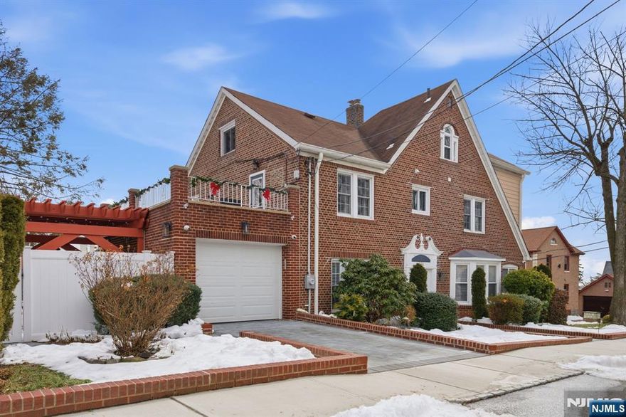 Exquisite Center Hall Colonial on the Bluff is move in ready. Perched on the cliffs in the most desirable section of town this home blends elegance with modern luxury. Enjoy sweeping views from the second-floor terrace, manicured grounds, and classic Belgian block curbing. Inside, a chef's kitchen with white quartz countertops anchors the home, while smart features which include whole house WI-FI, facial recognition cameras, and a sprinkler system. Attic is completely finished and renovated with 2 extra bonus rooms.A fully finished basement with room for extended family, game room, bar and entertaining space. This home has a garage gym, adaptable flex living space and parking for 4. Truly one of a kind!