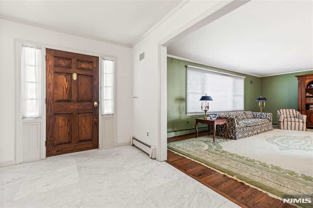 Photo of 645 Cambridge Road, Paramus, NJ 07652 (MLS # 25034504)