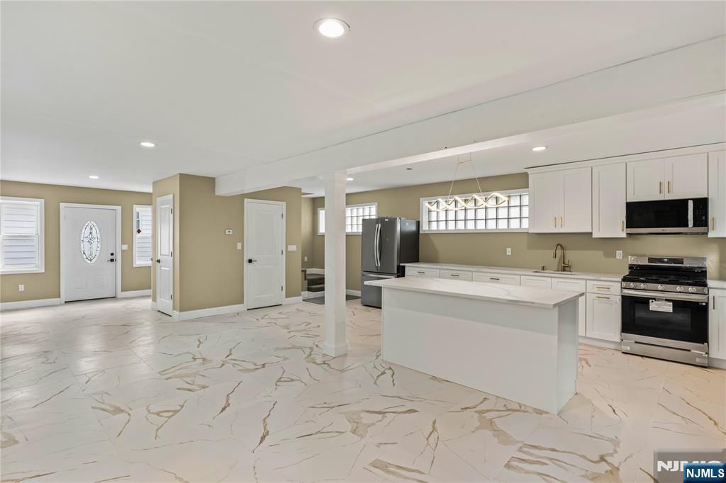 Photo of 63 Maple Avenue, Irvington, NJ 07111 (MLS # 25030497)