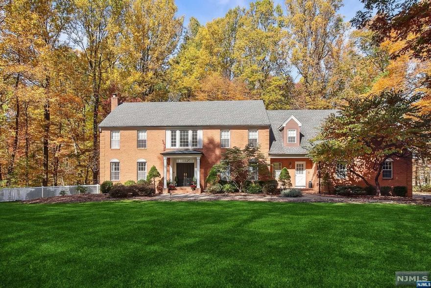 Custom 5-bed/3.1 bath,3 car garage w/EV charger on 3 priv.acres. Elegant styling can be found throughout generous rms,accented by large windows that capture the beauty of the property.2 fireplaces to gather around & generous formal and informal spaces for entertaining and everyday life.2-story foyer w/access to the formal Din Rm & adjacent Liv Rm. Features polished tile, hdwd flrs,Hi-hats lighting,Generator,Sec Sys,newer HVAC,and skylights.1st floor offers a cozy Family Rm, SunRm,formal Liv Rm,Dining Rm,Office,Den & laundry.Large gourmet Eatin Chef's kitch w/beautiful views from the Breakfast Rm.The dble deck provides space for al fresco dining & entertaining.The Fam Rm w/custom builtins and a den w/wood burning fireplace.The 2nd floor boasts 5 well-sized bedrms. The primary suite features walk in closets and a spa-like new marble bath w/jacuzzi and oversized shower & heated flrs. 4 more bedrooms,2 full baths,and front & back staircases A partially finished lower lvl .