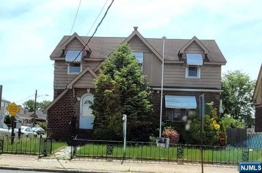 Charming colonial offers a comfortable & versatile living space w/3BRS & 1.5 baths. Interior is flooded w/natural light, accentuating the spaciousness of the rooms adorned w/beautiful hwd floors. Offering ample storage throughout this home provides convenient solutions for organization. Eat-in kit boasts plentiful cabinets. Formal dining & living room feature a cozy wood-burning fireplace w/insert perfect for colder evenings. Finished basement w/half bath adds valuable additional living or recreational space. Situated on a corner lot, property benefits from being zoned for commercial use making it ideal for offices or retail ventures. Prime location guarantees excellent exposure, attracting attention to any business conducted here. Fenced-in yard w/3 sheds offers privacy. Large open porch provides a welcoming outdoor space. Parking for 6 vehicles plus street parking. Major highways, transportation options, shopping & schools further enhances the appeal of this remarkable home.