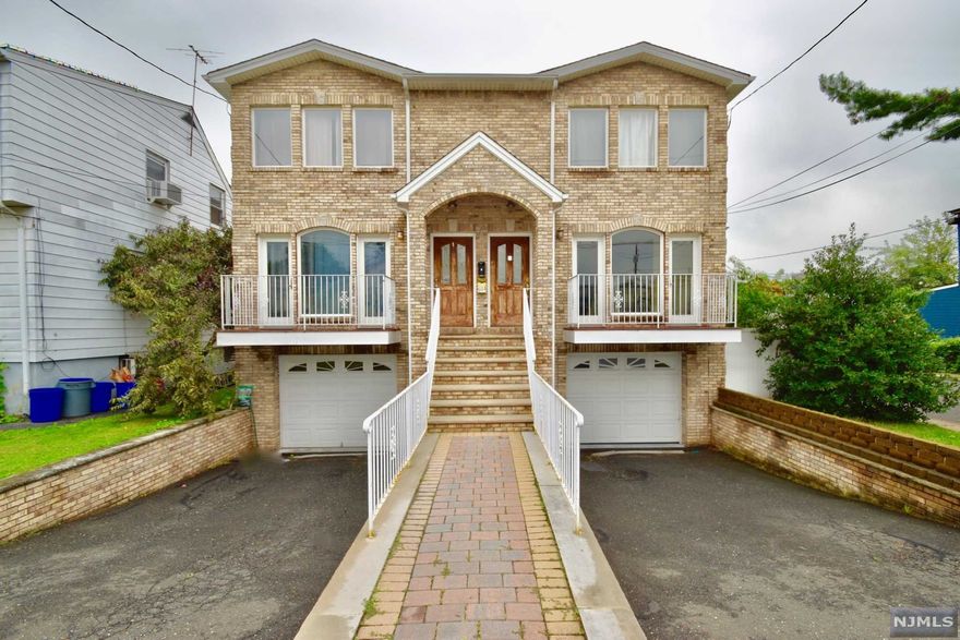 3BR,2.5BATH 2006 BUILT NEWER CONSTRUCTION SIDE BY SIDE 2FAMILY HOUSE LOCATED IN NICE & QUIET RESIDENTIAL AREA, CARLSTADT. THIS OPEN LAYOUT GORGEOUS HOME FEATURES ALL HARDWOOD FLOORS THROUGHOUT, LARGE LIVING ROOM W/BALCONY, GORGEOUS MODERN EAT IN KITCHEN W/GRANITE COUNTER TOP, SLIDING DOOR TO DECK & BACKYARD... 2ND FLOOR OFFERS LARGE MASTER BEDROM W/FBTH-JACUZZI, LARGE TWO MORE BEDROOMS..FINISHED BASEMENT HAS FAMILY ROOM, LAUNDRY ROOM, ATTACHED GARAGE..CLOSE TO NY TRANSPORTATION!!! PLEASURE TO SHOW!!!