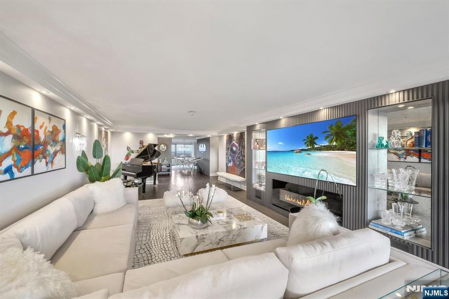 This one of a kind renovated luxury home soars above the city, blending high fashion and couture design to create a space thatâ€™s as stunning as it is functional. Every inch of this residence exudes modern elegance, with custom finishes and curated details that rival the pages of a fashion editorial. From the sleek kitchen, to the spa-inspired bathroom this home is a sanctuary style. Walls of glass frame breathtaking, panoramic views, immersing you in the cityscape from sunrise to nightfall. The open-concept layout is perfect for entertaining or simply soaking in the atmosphere, while bespoke lighting and tailored fixtures set the perfect mood for every occasion. Step out onto the expansive balconyâ€”your private runway to the skyline. Whether itâ€™s sipping champagne under the stars or hosting a chic soirée, this space is an invitation to elevate your perspective on high-rise living. With exclusive access to world-class amenities, pool, fitness center, and private concierge