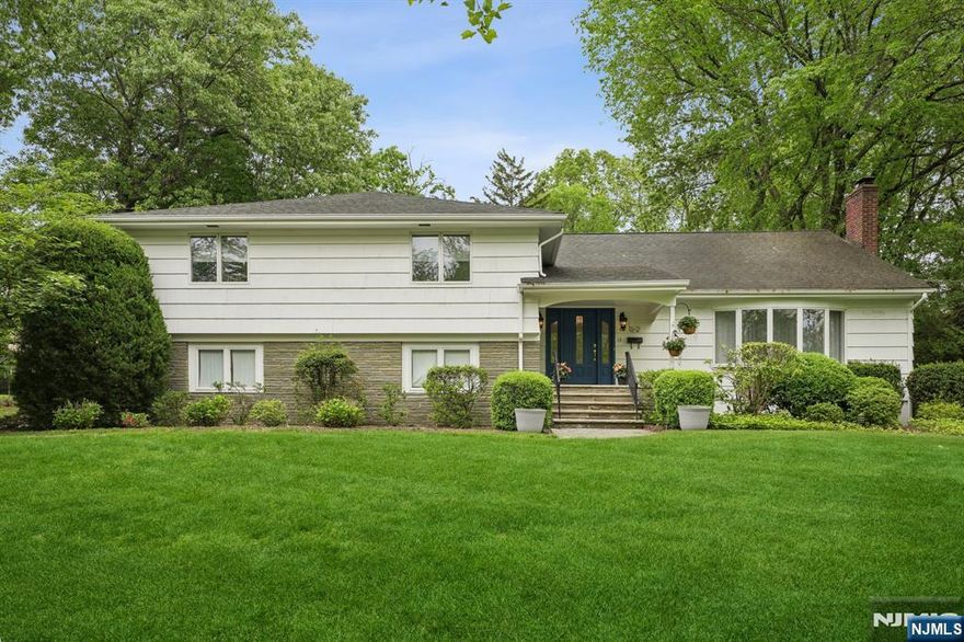 Nestled on a picturesque and quiet street, in the very desirable RIKER HILL section of Livingston, this spacious 4-bedroom, 3-full-bath split-level home offers the perfect blend of comfort, style, and functionality. Step inside and immediately feel the warmth of a home designed with flow and livability in mind. The main level boasts an inviting layout ideal for entertaining, with a seamless transition from the generous living and dining areas to a lovely kitchen, with abundant wood cabinetry, and very generous counter space, including a center island. Step outside to a large, private backyard oasis, complete with a stunning deck perfect for summer barbecues, morning coffee, or evening relaxation. The main level boasts an inviting layout ideal for entertaining, with a seamless transition from the generous living and dining areas to a spacious kitchen. The upper level offers well-sized bedrooms, including a serene primary suite with ample closet space and an en-suite bath. Downstairs, the fully finished basement expands your living space dramatically, featuring a bonus room ideal for a home office, gym, or guest suite, and a third full bathroom for added convenience. Additional highlights include a 2-car garage, abundant storage, and thoughtful updates throughout. This home truly has it all space, style, and a fantastic location... Close to schools, shopping, houses of worship, and major highways.