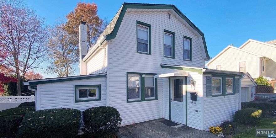 Back on the market! Charming Cape Cod Residence. This delightful two-bedroom, one-bathroom home exudes classic charm and modern potential. Nestled in a serene neighborhood, it features a steeply pitched gable roof and white vinyl siding, offering timeless curb appeal. The cozy interior includes a warm living room with traditional wood paneling upstairs, inviting natural light through its ample windows. Two comfortable bedrooms promise restful nights, while the efficient kitchen and quaint bathroom provide functional living spaces. A single-car driveway adds to the convenience. With no basement, the simplicity of two-level living awaits. Ideal as a starter home or downsize home, this house is a canvas ready for your personal touch to create the perfect home. Walk to South End elementary school. No variance required in Cedar Grove to build upward. Previous buyer couldn't secure financing, but the good news is that the property passed the FHA appraisal.