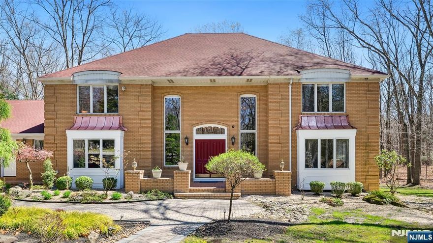 Welcome to this gorgeous mansion nestled in the serene residential area of East Brunswick, NJ. This exquisite home offers a beautiful blend of modern amenities and handmade carpentry, creating an inviting and luxurious atmosphere. Step inside to discover a spacious primary en-suite, along with three large bedrooms that provide ample space for family and guests. With 5.5 bathrooms, convenience and comfort are at the forefront of this stunning residence. The living room exudes elegance, while the dining room sets the stage for memorable gatherings. For those requiring a dedicated workspace, the office offers a peaceful retreat. Enjoy the sun-drenched sunroom, perfect for relaxation and enjoying your morning coffee. The chefâ€™s kitchen is a culinary dream, equipped with top-of-the-line appliances and an open layout ideal for entertaining. Outside, the property features an impressive 1600 square feet of deck space under an awning, along with a sprawling 2000 square feet of exterior patio, perfect for resort-style living. Completing this remarkable home is a spacious three-car garage, ensuring plenty of room for vehicles and storage. Donâ€™t miss the opportunity to own this stunning mansion, where luxury meets charm in a tranquil setting!