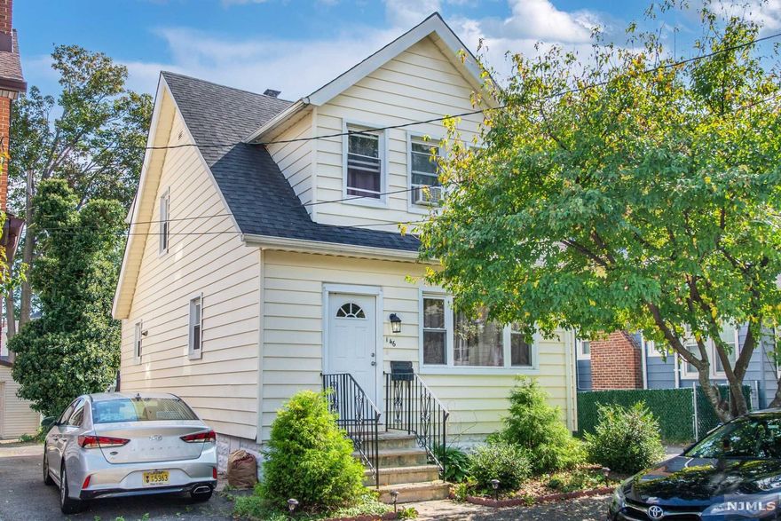 Beautiful, fully renovated side-hall Colonial! Upon entry enjoy the enclosed sun porch. Kitchen has granite countertops, newer cabinetry, and SS range/oven & microwave! Renovated powder room on 1st level. Open floor plan with the living room flowing seamlessly into the formal dining room & breakfast bar. Crown Molding throughout! Finished hardwood floors on both levels. 3 bedrooms and full bath upstairs