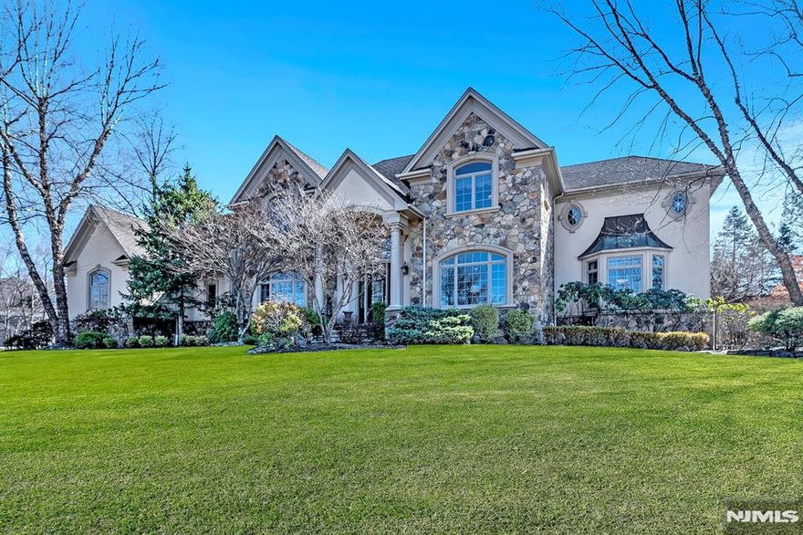 An architectural masterpiece by Jeffrey Beer, this extraordinary manor exudes luxury and sophistication at every turn. Designed with impeccable attention to detail, the interiors showcase bespoke craftsmanship, refined finishes, and thoughtfully curated lighting, creating an atmosphere of timeless elegance. Featuring five opulent bedrooms plus a second story bonus room, a show stopping gourmet kitchen, a grand two-story foyer, and a stately office with a fireplace, every space is a vision of refinement. The lavish primary suite offers a serene retreat with a private sitting area. Step outside to your private resort-style oasis an impeccably landscaped backyard boasting a gunite saltwater pool with a cascading waterfall, ambient accent lighting, an outdoor speaker system, and a chic pergola-covered lounge. A sprawling walkout basement and a three-car garage complete this unparalleled residence, perfectly positioned in one of Warren's most prestigious enclaves.