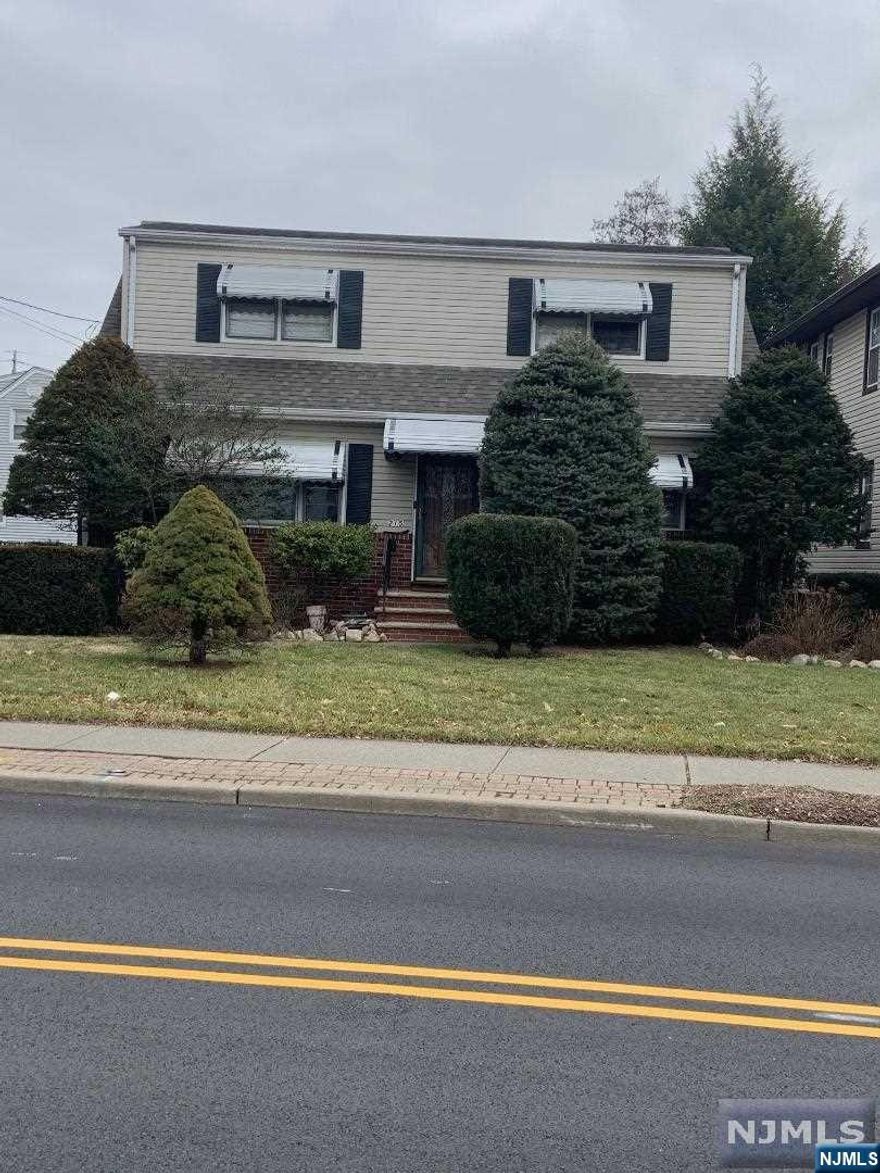 TWO FAMILY WITH 2 BEDROOMS EACH FLOOR...RENTS UNDER MARKET - SHOULD BE CLOSER TO $2000/MONTH. LOW TAXES!