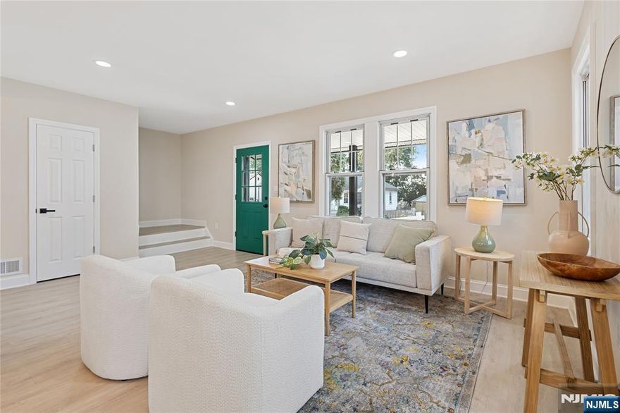 Welcome to Emerald St â€” a stunning, fully gut-renovated single-family home on a quiet dead-end street in Hackensack. Showcasing elegant emerald accents, this home features a first-floor primary suite, brand-new roof, siding, retaining wall, 2-zone central heat/air, and all-new plumbing and electrical. Parking is available in the back. Ideally situated just minutes from Target, Riverside Square Mall, and only a 4-minute walk to the NYC bus stop, offering a quick Manhattan commute. A perfect blend of modern luxury and convenience! Saturday Dec 20th Open House 1-3pm