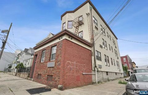 Photo of 109 10th ST #2F, Passaic, NJ 07055 (MLS # 26024808)