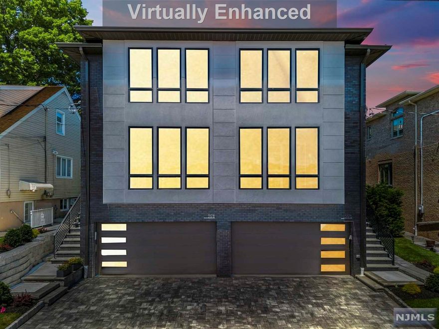 Welcome to the very best location Palisades Park has to offer. This designer Two Family is tucked away on a wide serene st blocks from Broad Ave. Each unit features a total of 5 bedrooms, 4 full baths, a 2 car garage engineered hardwood floors with an ELEVATOR! The ground level is equipped with a 2 car garage, bedroom, living room with a full bath. The second level features radiant heated floors all throughout, a family room, galley style designer kitchen, dining room, grand entry foyer with a bedroom/office and a full bath. The top level features 3 bedrooms, master bath and a jack and jill bath along with a laundry room. The elevator services all three floors. Special attention was given to this duplex by an interior designer.