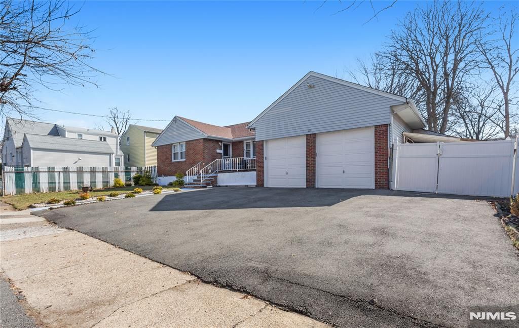 Photo of 28 Logan Place, Lodi, NJ 07644 (MLS # 26008216)