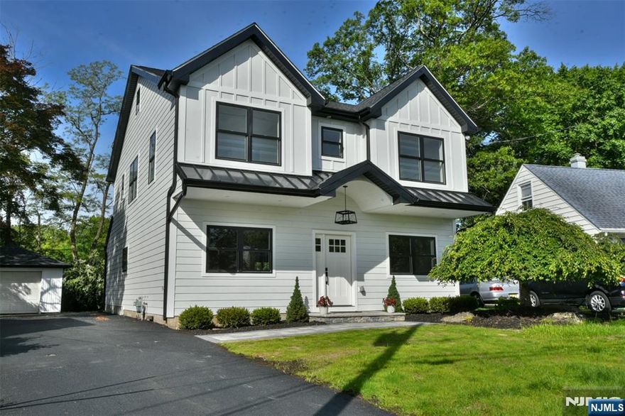 New, New, New- Everything in this Home in New! Located in the Charming Town of Waldwick, this Newly Constructed, 4 Bedroom Colonial with a Paver Walkway and Hardie Plank Siding, is the perfect place to call home. The first floor includes a Dining Room, Formal Living Room, and a Spacious Kitchen that flows directly into the Family Room with Sliding Glass Doors to the backyard. Youâ€™ll absolutely love all the attention paid to detail in the Fabulous Kitchen that boasts Port and Bell Plywood Constructed Cabinets, Waterfall Quatrz Counters, a Coffee Station, Stainless Steel Appliances, a Custom Exhaust Hood and an Extra-Large Center Island perfect for gathering friends. Completing the first floor is a separate backdoor entrance leading to a Mud Room, Powder Room, and a Laundry Area with hook ups and a Utility Sink. Located on the second floor is a Full Bath, and all Four Bedrooms, including the Primary Suite which has Two Walk-in Closets, a Double Sink, a Soaking Tub and Separate Extra-Large Shower Stall. Walk up to the third floor and youâ€™ll discover a generously sized, unfinished attic equipped with AC and Heat. Other Features include: Anderson Series Windows, Custom Tile in all Bathrooms, High Ceilings, Extra Large Molding and Casing, and 5â€ Oak Plank Hardwood Floors throughout the home. Located on a quiet residential street, this home is just blocks from the Waldwick Train Station and is a prime location for commuters.