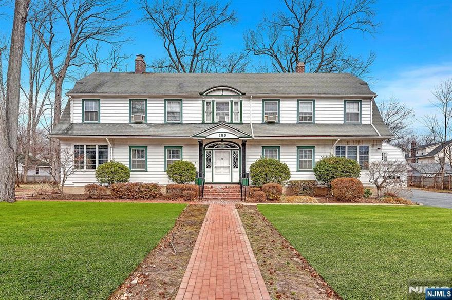 Welcome to 185 Fernwood Avenue, a rare opportunity to own a historic property listed for sale for the FIRST TIME EVER. Located in a sought-after Upper Montclair neighborhood, this large center-hall Colonial offers timeless design and rich history. Built as a memorial home for war widows after the owner's husband died in WWI, it features nine spacious bedrooms, four and a half bathrooms, and elegant details like crown moldings, a formal living room, dining room, sunroom, and solarium. The kitchen includes two Butler's pantries, and the home has two wood-burning fireplaces. The serene outdoor gazebo is perfect for relaxing. Just a block and a half from Sunset Park and two blocks from Upper Montclair Village and the train station, this home blends seclusion and convenience. Don't miss your chance to own a piece of Montclair historyâ€”schedule a tour today!