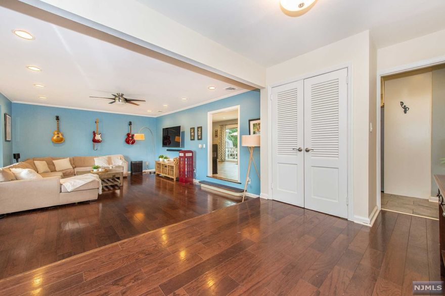 Spacious 3BR, 2.1BTH Ranch with attached two car garage nestled on an oversized lot in West Orange. Beautifully renovated kitchen (2014) featuring peninsula island, marble counter tops, white wood cabinetry, S/S appliances, subway tile backsplash, wine refrigerator. Primary Suite with oversized closets, hardwood floors, recessed lights. Renovated primary bath (2019) and main bath (2014). Two additional bedrooms with recessed lights and hardwood floors. Family Room with woodburning fireplace, hardwood floors, recessed lights, sliders to outdoor patio and French doors leading to kitchen. Living Room with beautiful bay windows, hardwood floors, recessed lighting. Large entry foyer with newer front door with side lights. Plan on relaxing this summer in the backyard which boasts a large level lot and mature trees. Paver patio and stone walls built in 2016. Roof was a complete tear off done in 2020. Large basement featuring recreation room, built in bar area. Finished basement including