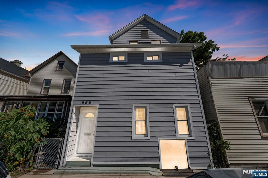 Welcome to this beautifully renovated two-family home! The spacious second floor duplex apartment truly feels like a private single family residence. It features a luxurious primary bedroom with en-suite bath, a separate dining room, generous living room, stylish kitchen, and a full guest bathroom, plus direct access to the backyard through the rear doors. Enjoy complete privacy with central A/C and hot forced air. The first floor unit offers 2 bedrooms and 1 full bath. Please note: the renovation will be fully completed prior to closing, including the kitchen counters and any remaining finishes. Thoughtfully updated to today's market tastes and ideally located near the train station, bus transportation, major highways, and more. Live in one unit and rent the other, this property is the perfect blend of modern design and investment potential! There is a backyard currently being cleaned and set up, come and check it out!