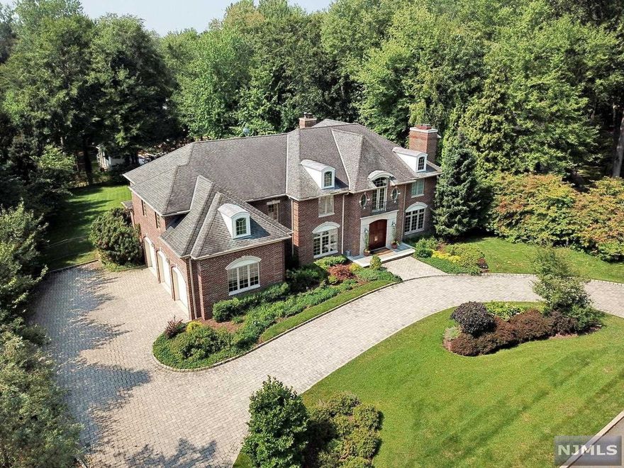 SPECTACULAR CUSTOM COLONIAL ON THE HILL!! 6 BEDROOM, 6.5 BATHS SITUATED ON A .72 ACRE PROPERTY WITH TOP OF THE LINE AMENITIES THROUGH OUT. 1ST.FLOOR ENTERS INTO A 2 STORY FOYER,LIBRARY/OFF/GAS FPL, FORMAL DR, BUTLERS PANTRY TO MEIK, POWDER, RM, GAME RM, FR/FPL,LAUNDRY RM, ENTRY FROM 3 CAR ATT.GARAGE, GUEST BR/FBTH. 2ND.FLOOR OFFERS THE PRIMARY BR, SITTING M/GAS FPL, HIS & HER WI.CL& DRESSING AREA, 3 MORE BEDROOM SUITES WITH FULL BATHS, LG.BONUS/PLAY RM. FULL BASEMENT WITH FINISHED REC RM, SUMMER KITCHEN, BR,FBTH, MUSIC RM, GYM, UTILITIES & STORAGE.