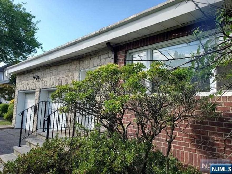 Only minutes away from the GW Bridge and NYC, is this well maintained four bedroom home with stone and brick exterior in gorgeous Englewood Cliffs. Enter into a gracious living room with stone fireplace and lots of windows. Living room flows into dining and kitchen with granite countertops and newer appliances. First floor has a large bedroom and full bathroom. Upstairs is a primary suite, two additional large bedrooms and full bath with tub/shower. Recessed lighting and hardwood floors throughout. Two car garage with high ceilings and storage. The basement is partially finished . Beautiful backyard with a stone patio for entertainment and ample green space for play. Convenient to transportation, shopping and schools. Landlord will pay half of month rent for the realtor fee.