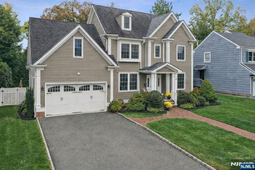 Nestled on a quiet street that dead-ends at iconic Brookdale Park, this newer and sizable, custom Colonial offers the perfect blend of sophistication and comfort. The first floor features multiple living areas, including a generous dining rm, formal living rm, and an open-concept kitchen and family room. The sunny breakfast nook overlooks the sweeping backyard, making it ideal for both everyday living and entertaining. Enjoy the convenience of pulling directly into the double attached garage with easy access to the mudroom just off the kitchen.The living space continues into the very large finished basement, complete with a TV lounge, ping-pong area, gym, and built-in bar perfect for movie nights, play space, or hosting guests.The second floor features a serene primary suite with a gas fireplace, large en-suite bath, two walk-in closets, and a bonus room ideal for a home office or reading retreat. Three additional generously sized bedrooms include en-suite and Jack-and-Jill bathrooms. The expansive unfinished third floor offers endless potential.Outside, enjoy the fully fenced, private backyard and paver patio perfect for quiet evenings or lively gatherings. Centrally located in Montclair, just moments from Watchung Plaza's beloved bookstore, caf s, restaurants, shopping, and the NJ transit train station, this home truly has it all!