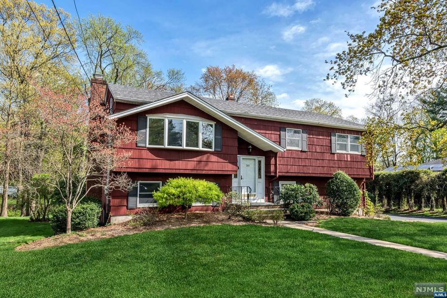 First time on market in 50 + years and Opportunity knocks to get into a great Ridgewood neighborhood at an affordable price! Hardwood floors throughout upper level, which features Living Room, Dining Room, Updated kitchen, three bedrooms and a full bath (SOT). Lower level offers 4th bedroom, full bath (SS), laundry and a Family Room/Den with fireplace and SGD out to rear yard. 2 car garage and central AC. Pretty rear yard with plenty of space to enjoy. Blue ribbon Ridgewood schools and close proximity to transportation.