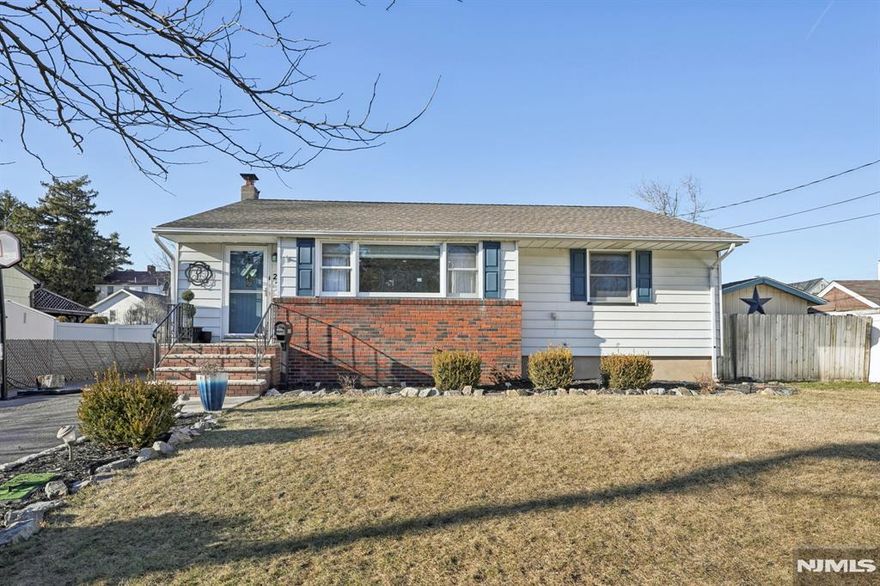 Welcome to this charming, meticulously maintained 3-bedroom, 1.5-bath Ranch on a level lot in a quiet neighborhood. The inviting foyer leads to a bright, spacious living room, perfect for relaxation and gatherings. The adjacent dining room flows into an updated kitchen with custom cabinetry, marble countertops, a stylish backsplash, and stainless steel appliances. A cozy family room features vaulted ceilings, a wood-burning fireplace, and sliding glass doors to the backyard. The primary bedroom offers a large closet and private retreat, while two additional bedrooms, a full bath, and a powder room complete the main level. The finished basement adds bonus living space with a den, bar, storage, and laundry room. Outside, enjoy a fenced backyard with a patio for grilling and entertaining, plus ample space for outdoor activities. Conveniently located near Pompton Lakesâ€™ downtown, shopping, dining, and NYC transportation, this home offers comfort, style, and convenience!