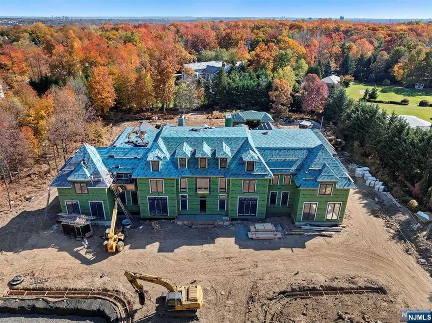 Approximately 20,000 sq ft on all four levels of this brick and limestone manor with slate roof on two acres on a quiet cul-de-sac in Rio Vista Estates. Home to have 7 bedroom suites including primary bedroom wing with two baths and two closets. First floor to include large kitchen with prep kitchen, wine room, library, dining and two-story great room and foyer. Lower level to have guest suite, gym and theatre. Elevator to all floors. Pool, spa, and cabana. A rare opportunity to put your custom touches to this Rio Vista Estate! Projected Completion Date 2025. ***PROPERTY BEING PURCHASED AS-IS:FRAMED WITH ROOF INSTALLTION***
