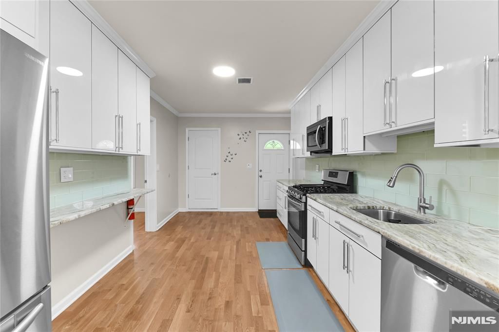 Photo of 1208 67th Street, North Bergen, NJ 07047 (MLS # 26014645)