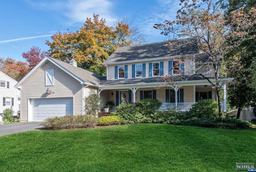 This charming colonial nestled in desirable Ho-Ho-Kus is a delightful blend of classic design and modern convenience, perfectly complemented by its idyllic location. Situated within minutes of the award-winning K-8 School, North Field, vibrant downtown shops, and commuter transportation, the location can't be beat! Step inside to discover an inviting and spacious interior ready for your personal touches. The first fl offers a sunlit living room, formal DR, large cook's kitchen, and FR with gas fireplace and custom built-ins. Upstairs, the second level boasts a relaxing primary suite, offering a private retreat with a spacious BR, bath, and walk-in closet. Three additional generously sized bedrooms and a full bathroom provide comfortable accommodations for all. The outdoor space includes a large two car attached garage, wraparound front porch, tiered deck overlooking the serene backyard, and meticulous landscaping. Don't miss the chance to make this captivating colonial your own!